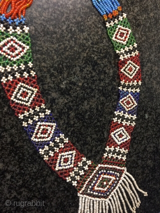 a fine antique glass bead woven Central Asian necklace from Nuristan region of Afghanistan. Ethnographic arts of Nuristan (be it textiles, jewellery or wood artefacts) are very distinct in comparison to other  ...