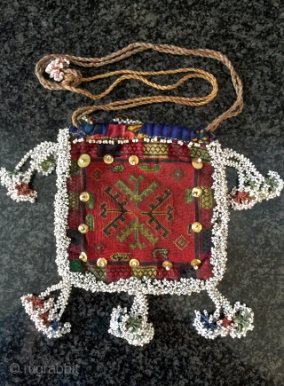 Another  beautiful antique silk embroidered and glass bead woven Central Asian bag from Nuristan region of Afghanistan. Ethnographic arts of Nuristan (be it textiles or wood artefacts) are very distinct in  ...