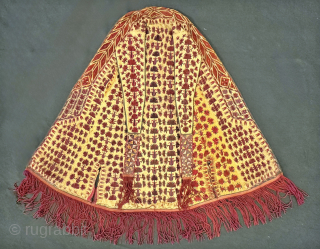 An outstanding and very rare published antique Tekke Turkoman / Turkmen silk embroidered on silk yellow Chyrpy ( Cherpi / Chirpi / Chyrpi ), dating to the second half of 19th Century.  ...