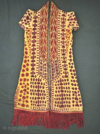 An outstanding and very rare published antique Tekke Turkoman / Turkmen silk embroidered on silk yellow Chyrpy ( Cherpi / Chirpi / Chyrpi ), dating to the second half of 19th Century.  ...