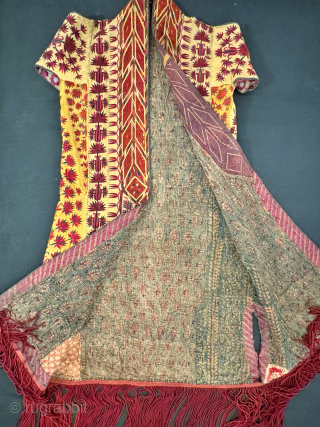 An outstanding and very rare published antique Tekke Turkoman / Turkmen silk embroidered on silk yellow Chyrpy ( Cherpi / Chirpi / Chyrpi ), dating to the second half of 19th Century.  ...