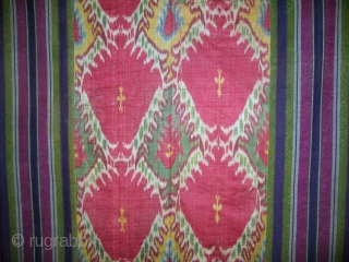 An exceptional Antique Uzbek Adras Ikat Wall Hanging from Bokhara / Bukhara region of Uzbekistan. It dates to third quarter of 19th Cent. It is a silk warp/cotton weft padded adras panel.  ...