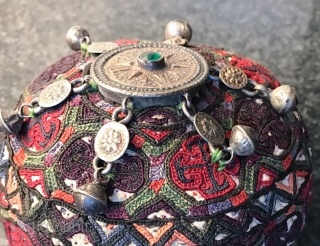 A rare complete antique silk embroidered Yomud / Yomut tribe Turkoman / Turkmen young man / boy's hat with original gold appliqué on silver  talismanic crown. There is a distinctive beauty  ...