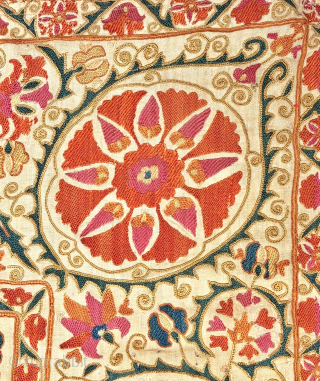 A stunning mid-19th century Antique Uzbek Bukhara Suzani, showcasing exceptionally fine silk embroidery on a linen Karbos ground. This large-scale masterpiece features chain-stitched and basma/flat stitch techniques. The vibrant field design displays  ...