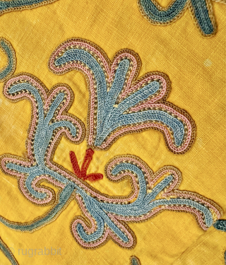 A beautiful antique Uzbek silk embroidered suzani on a yellow cotton ground from rural Shahrisabz region.  Dating to the early 3rd quarter of the 19th century, it boasts an extremely fine  ...