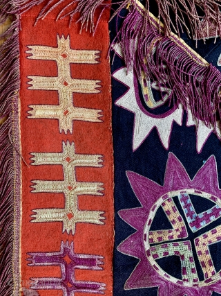 An excellent antique Uzbek Lakai silk embroidered ayna khalta / ilgich, dating to late 19th century. This envelope shaped talismanic hanging with a false flap represents the wedding ceremonial mirror bags. This  ...