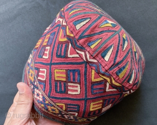 An exceptional antique Turkoman / Turkmen silk embroidered on silk bridal hat attributed to the Tekke / Teke tribe. Dating to the 19th century, this rare textile was an integral part of  ...