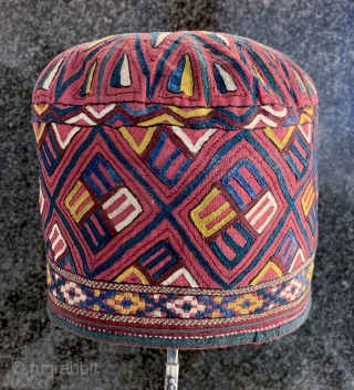 An exceptional antique Turkoman / Turkmen silk embroidered on silk bridal hat attributed to the Tekke / Teke tribe. Dating to the 19th century, this rare textile was an integral part of  ...