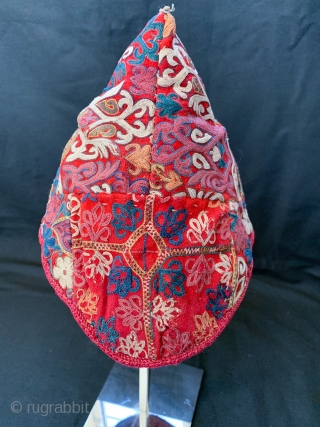 An exceptional antique Turkoman Turkmen Chodor tribe silk embroidered hat dating to the 19th century. Though the hat is somewhat fragmented, I think it was reduced from a larger hat and done  ...