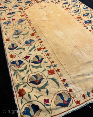 A beautiful and elegant antique silk suzani / susani from the 19th century Ura tube region. Suzanis are often attributed to the Uzbek people of Central Asia but these dowry embroideries were  ...