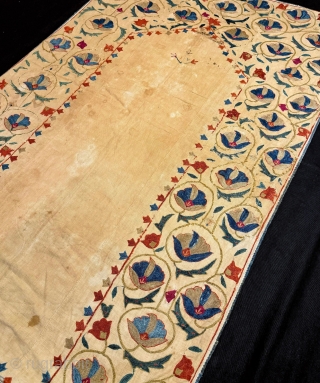 A beautiful and elegant antique silk suzani / susani from the 19th century Ura tube region. Suzanis are often attributed to the Uzbek people of Central Asia but these dowry embroideries were  ...