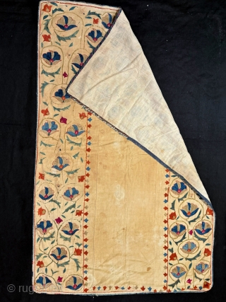 A beautiful and elegant antique silk suzani / susani from the 19th century Ura tube region. Suzanis are often attributed to the Uzbek people of Central Asia but these dowry embroideries were  ...