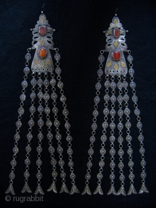 A very rare pair of Antique bridal Turkoman / Turkmen Yomud / Yomut Adamlyk made of high grade silver with gold applique and carnelian. This piece dates to late 19th Century. Adamlyks  ...
