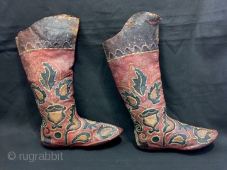 An exceptional antique Central Asian leather appliqué boots dating to the second half of the 19th century. This particular is relatively older than most one sees in the market and many of  ...