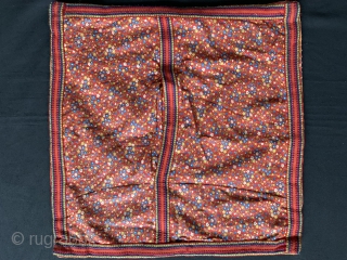 A fine antique Indian silk embroidered hanging from Gujarat (turned into a functional pillow). It dates around 1900  and is a really fine work of textile art. The red field is  ...