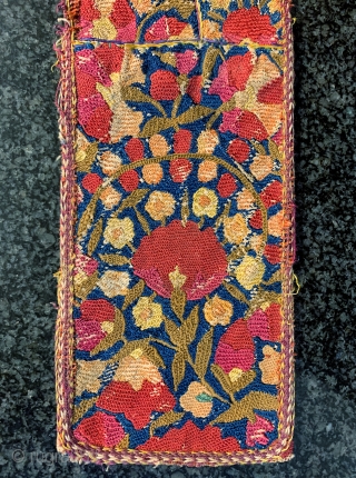 An exceptional antique fully silk embroidered Uzbek Bridal hair braid cover dating to the 3rd quarter of 19th Century. It is fully silk embroidery using very fine basma stitch. Often these are  ...