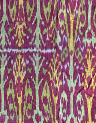An excellent Antique Central Asian Adras Ikat Chapan / Robe made by the Tajik people of Ferghana Valley / Kokand region. It dates to the early third quarter of 19th century.   ...