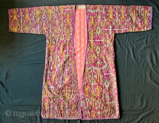 An excellent Antique Central Asian Adras Ikat Chapan / Robe made by the Tajik people of Ferghana Valley / Kokand region. It dates to the early third quarter of 19th century.   ...