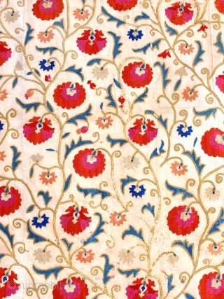 A splendid Uzbek silk nim suzani from the oasis of Bukhara, dating back to the first half of the 19th century on account of its bold, uncluttered design and brilliant natural colour  ...