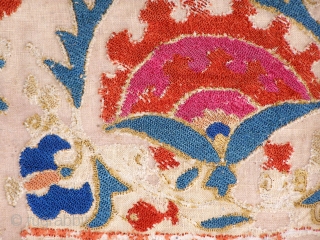 A splendid Uzbek silk nim suzani from the oasis of Bukhara, dating back to the first half of the 19th century on account of its bold, uncluttered design and brilliant natural colour  ...