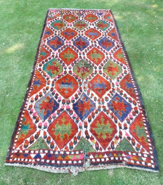 Uzbek Julkhyr with ikat design, four vertical lengths joined. 345 x 140 cm. First half 20th Century.                