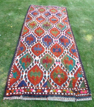 Uzbek Julkhyr with ikat design, four vertical lengths joined. 345 x 140 cm. First half 20th Century.                