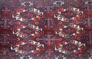 A mid-19th century 12-gul Tekke torba, with superb saturated dyes and silk highlights. 14" x 44", 36 x 112cm              