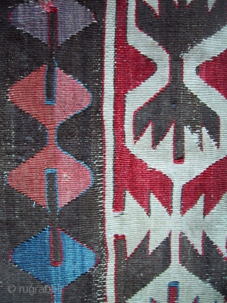 An early Konya kilim fragment  27 x 83cm, 10.75 x 32.5" with an added metal brocade border.               