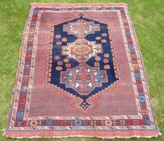 An interesting Afshar rug with three Turkmen guls. Worn but attractive. All good colours, late 19th Century. 5'6" x 4'4" / 168 x 130 cm.        