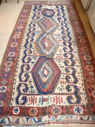 An early 19th century Central Anatolian kilim with wondrous colours. 390 x 195 cm / 12'10" x 6'5".               