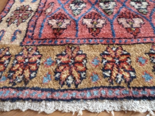 A thick gabbeh/yatak type rug, possibly Kurdish from North West Persia. 185 x 136 cm. Luminous natural colours and long-staple glossy wool on a cotton foundation. There is an old repair to  ...