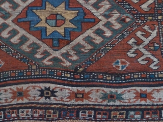 A vibrant Karabagh Kazak, late 19th Century. 258 x 110 cm. The ends are rewoven and there is some old repiling, but overall in good condition.       