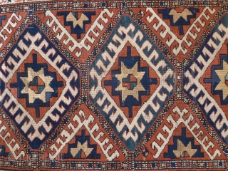 A vibrant Karabagh Kazak, late 19th Century. 258 x 110 cm. The ends are rewoven and there is some old repiling, but overall in good condition.       