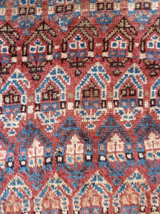 A Moghan Kurdish rug, c. 1900, with excellent long wool and lively boteh design. 271 x 110 cm               