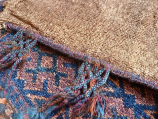 A lush Belouch khorjin, with superb silky long-staple wool and all good colours. Original plainweave back and braided side-tassels. First half 20th Century, size 98 x 63 cm     