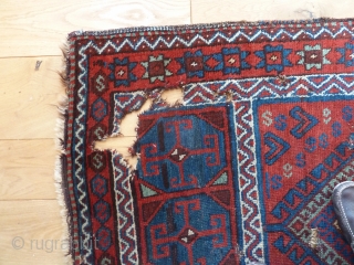 A good 19th Century Shavak anatolian rug, with lustrous wool and saturated natural colours. Damaged as seen - needs washing and conservation/repair. 240 x 108 cm.       