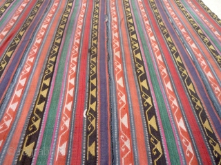 A silk jajim from Sheki, Azerbaijan, c. 1900 or early 20th century.  Made up of narrow strips sown together. 128 x 88cm          