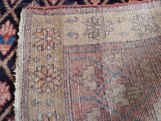 An unusual Northwest Persian rug, early 20th Century. Flower filled lattice design. Repair at one end, otherwise great condition. All good colours and very soft wool. 190 x 137 cm   