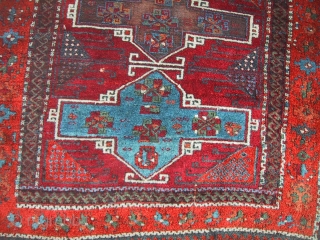 East Anatolian 19th Century Kurdish rug with wonderful saturated insect red, rust orange, sky blue and bottle green.
Size 6'8" x 4'5", 203 x 135cm. 
In original condition except for a small removed  ...
