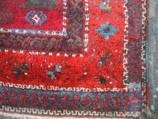 East Anatolian 19th Century Kurdish rug with wonderful saturated insect red, rust orange, sky blue and bottle green.
Size 6'8" x 4'5", 203 x 135cm. 
In original condition except for a small removed  ...