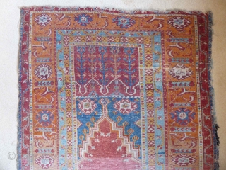 A beaten and faded Anatolian prayer rug, but still has plenty of charm. Late 19th Century, 195 x 122 cm. Friendly price.           