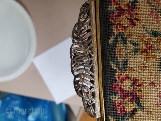 This lovely, well kept, antique, hand-made purse is the ultimate fashion accessory. Made in France circa 1900, the piece is still in near perfect condition. There is a tiny spot on the  ...