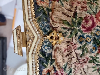 This beautiful antique purse was handmade in Paris, France circa 1900. This intricately created purse showcases a lovely and unique floral design which is the norm for these antiques. With a lovely  ...