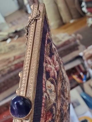 This beautiful Handwoven French makeup Purse still comes with its original mirror; made circa 1900. With its deep purple base color and glamorous fake gem clasp on top this purse is truly  ...