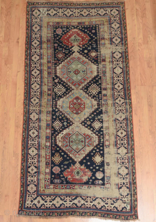 Rare find. Early Shirvan rug. The more you look, the more you see. A highly collectible piece. Size is approximately 269 x 127 cm. Please contact me at jakezacharybrown@outlook.com    