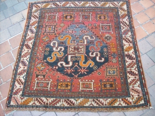 Chondzoresk rugs with this motive have been attributed to Kazak under the name of "Cloudband Kazak" the motive may derive from caucasian dragon carpet
it is probably the second most published karabagh motif.it  ...