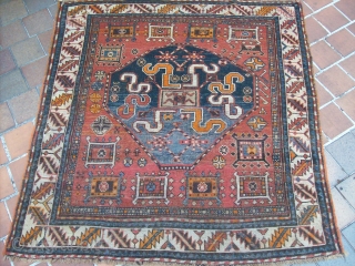 Chondzoresk rugs with this motive have been attributed to Kazak under the name of "Cloudband Kazak" the motive may derive from caucasian dragon carpet
it is probably the second most published karabagh motif.it  ...