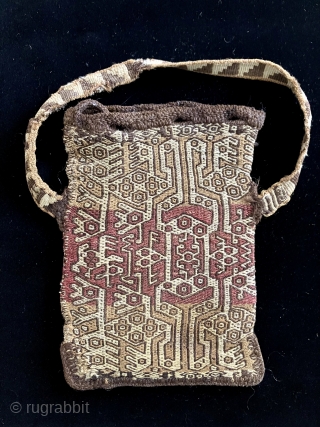 Very interesting Pre-Columbian coca bag with fantastic creatures. This bag has a uniquely complex composition of interlocking imagery on each side.   Both positive and negative spaces are readable and can  ...