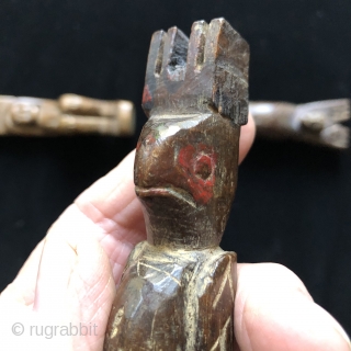 A bird in hand.  Carved wooden Guatemalan slingshot collection.  Carved from hardwood and personalized.  Used for hunting small game, birds and squirrels.  20th century.  Available as a  ...