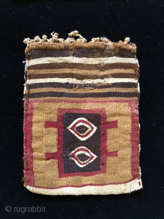 Two Inca period coca bags. A.D. 1400 - 1532.  These two small, interesting coca bags were woven in different structures. The smaller of the two bags is a rare, classic Incan  ...